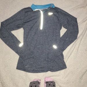Nikerunning long sleeve with thumb holes.